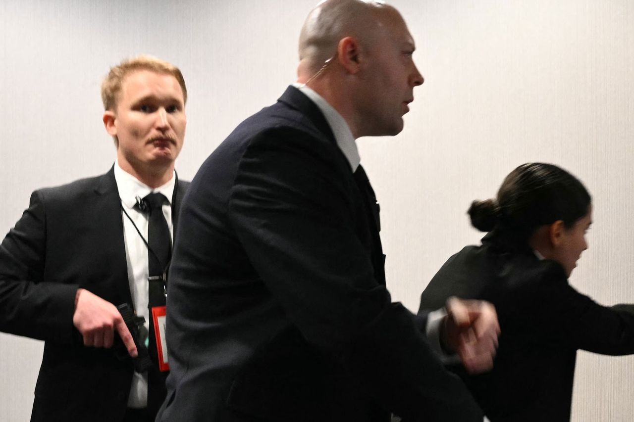 Agents draw their guns after loud bangs were heard during the White House Correspondents' Dinner on April 25, 2026Credit: Mandel NGAN / AFP via Getty