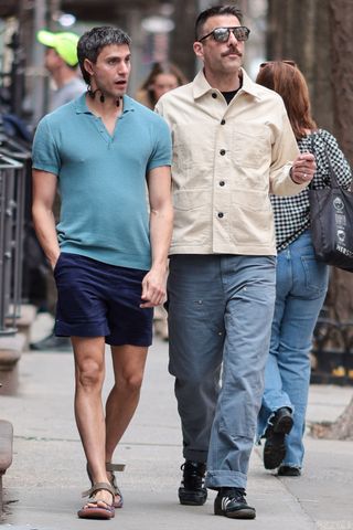 Zachary Quinto and Gideon Glick walking outdoors together Zachary Quinto and Gideon Glick.Credit: TheImageDirect.com