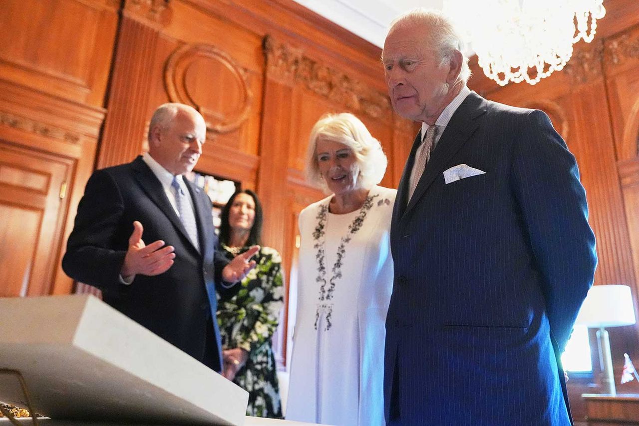 Queen Camilla and King Charles view items to be placed in a time capsule in the Ambassador's Library room of the British Embassy in Washington, D.C. on April 27, 2026.Credit: Julia Demaree Nikhinson-Pool/Getty