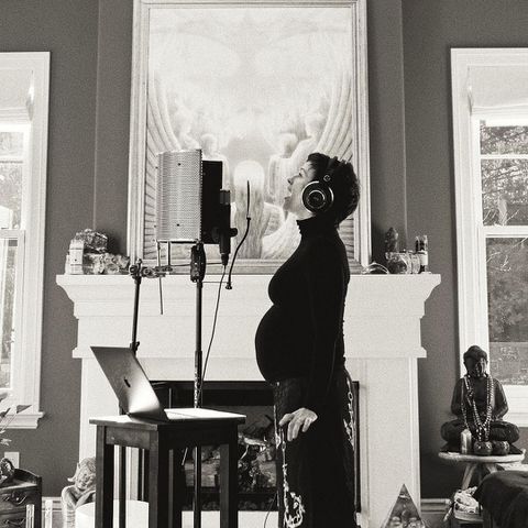 Alanis Morissette with a baby bump in a black-and-white photo from her home recording studio in 2019.Credit: Alanis Morissette/Instagram