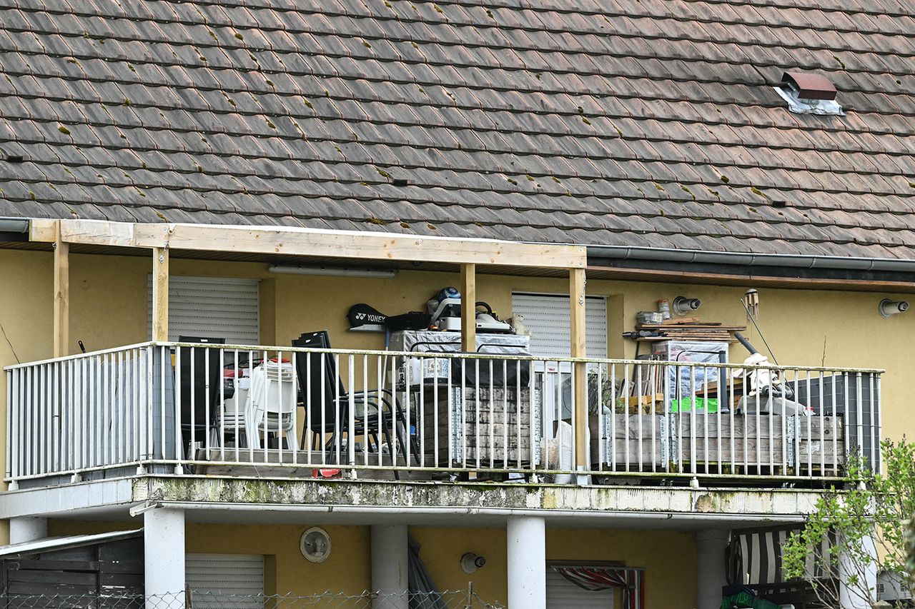 A photo shows the involved suspects' terrace at the first level of a residential building where which a boy was discovered in the courtyard naked and malnourished on a pile of rubbish in a van where he had been kept locked up, in Hagenbach, eastern France, on April 10, 2026 Residential building where boy was found locked in vanCredit: SEBASTIEN BOZON / AFP via Getty