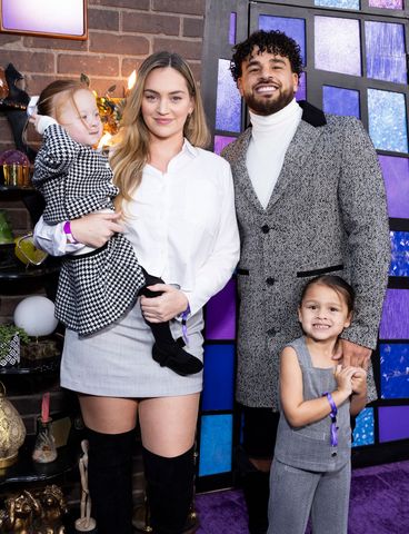 Taylor Selfridge and Cory Wharton Taylor Selfridge and Cory Wharton with their daughters in October 2024.Credit: Mark Von Holden/Disney/Getty