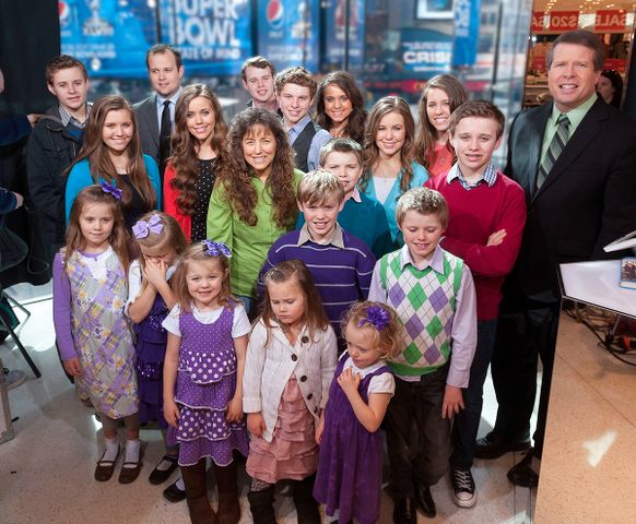 The Duggars on the set of Extra in 2014Credit: D Dipasupil/Getty