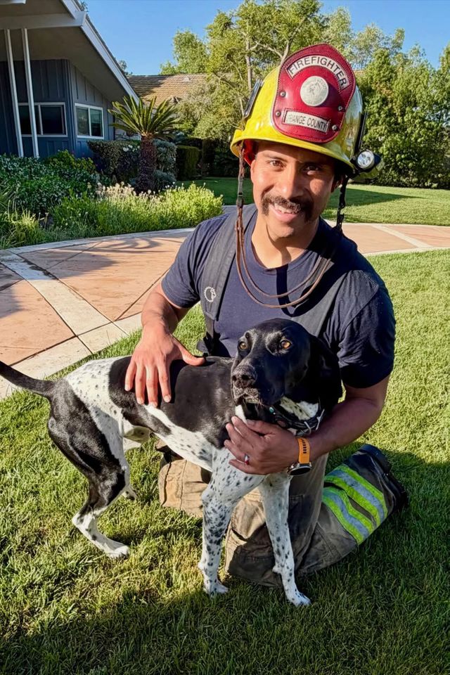 Fillmore poses with a firefighterCredit: ocfireauthority/Instagram
