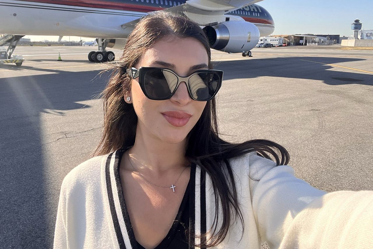 Julia Varvaro poses in front of a plane.Credit: Julia Varvaro/X
