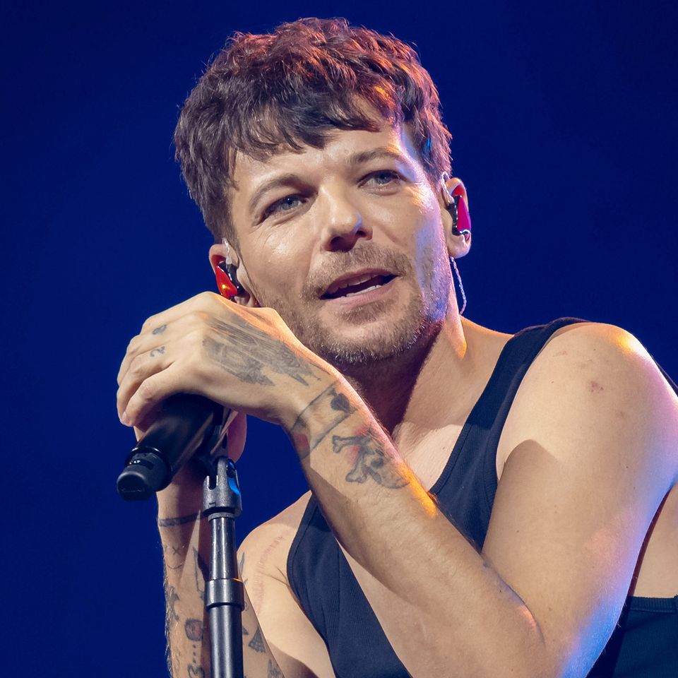 Louis Tomlinson performs live on stage during a concert Louis TomlinsonCredit: Frank Hoensch/Redferns