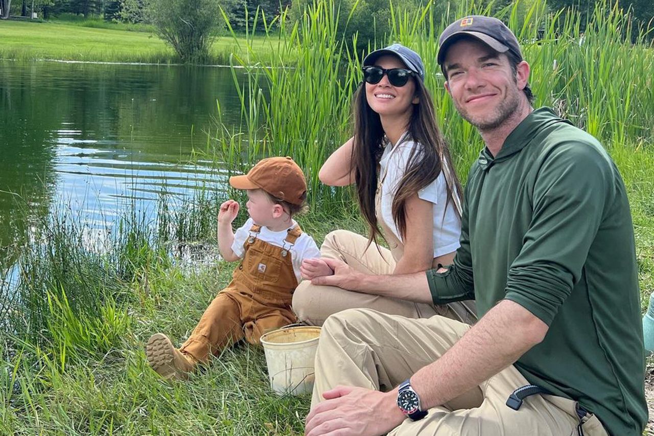 John Mulaney and Olivia Munn sitting by a pond with a child Olivia Munn (center) with husband John Mulaney (right) and son Malcolm (left).Credit: Olivia Munn/Instagram