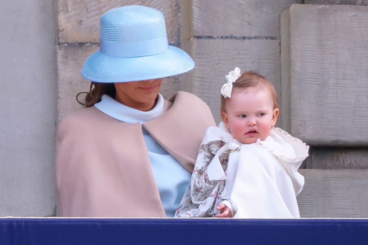 Princess Sofia holds Princess Ices on the balcony during 80th birthday celebrations for King Carl XVI GustafCredit: Michael Campanella/Getty