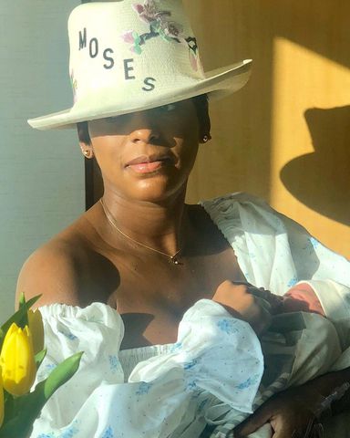 Tamron Hall posing with newborn son, Moses, in 2019.Credit: Tamron Hall/Instagram