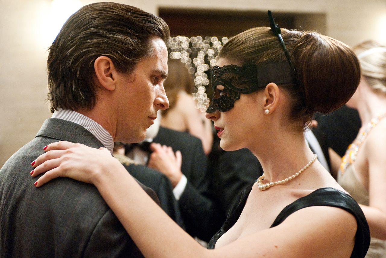 Christian Bale, Anne HathawayCredit: Ron Phillips/Warner Bros./courtesy Everett Collection