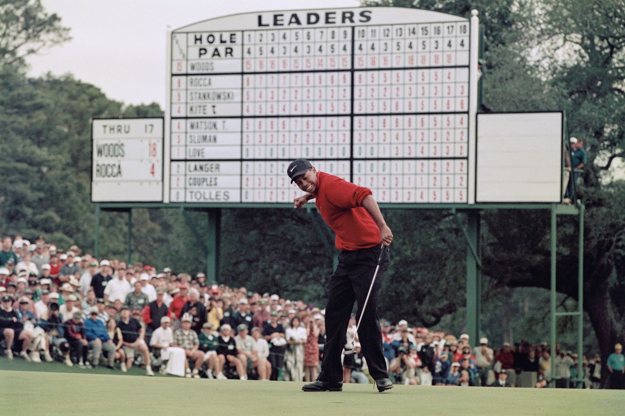 Tiger Woods celebrates after sinking a 4 feet putt to win the US Masters Golf Tournament in April 1997 in Augusta, Georgia.Credit: Stephen Munday/Allsport/Getty