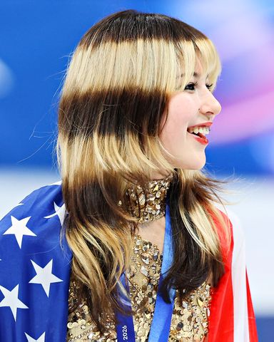 Gold medalist Alysa Liu celebrates on the podium during the medal ceremony at the 2026 Winter Olympics on Feb. 19, in Milan.Credit: Tang Xinyu/VCG via Getty