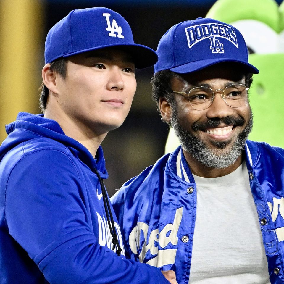 Pitcher Yoshinobu Yamamoto #18 of the Los Angeles Dodgers with actor Donald Glover Pitcher Yoshinobu Yamamoto and Donald GloverCredit: Keith Birmingham/MediaNews Group/Pasadena Star-News via Getty
