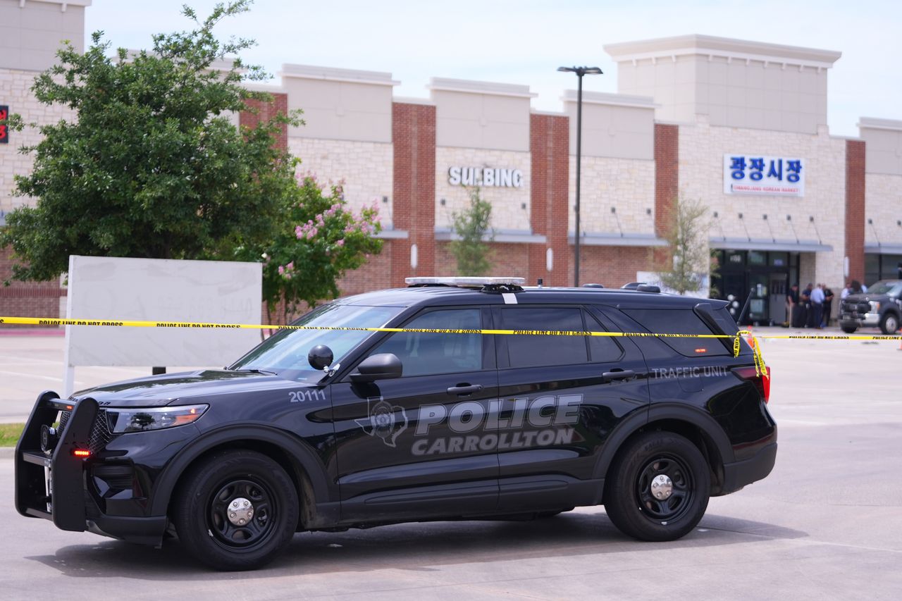 Police at the scene of the shooting in Carrollton, Texas.Credit: AP Photo/Julio Cortez