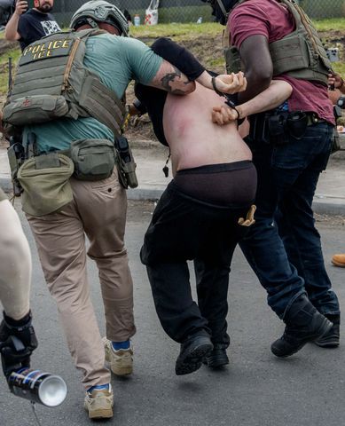 Federal agents detain a protestor outside the federal immigration center at Delaney Hall in Newark, where ICE is housing detained immigrants on May 26, 2026 in Newark, New Jersey. Federal agents detain a protestor outside the federal immigration center at Delaney Hall in Newark. N.J., on May 26.Credit: Adam Gray/Getty