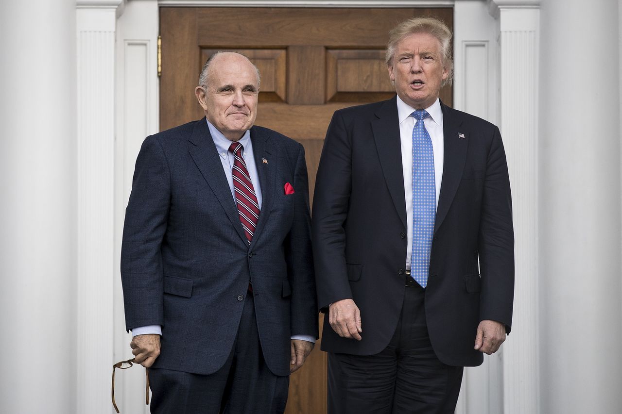 Former New York City mayor Rudy Giuliani stands with president-elect Donald Trump before their meeting at Trump International Golf Club, November 20, 2016 in Bedminster Township, New Jersey. Trump and his transition team are in the process of filling cabinet and other high level positions for the new administration. Rudy Giuliani and Donald Trump at Trump International Golf Course on Nov, 29, 2020Credit: Drew Angerer/Getty