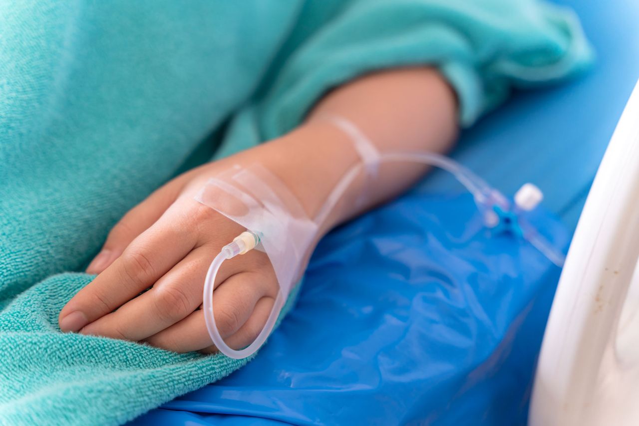 hand of the patient is on drip receiving a saline solution on bed VIP room at hospital. Medical Concept. A patient in a hospital bed (stock image)Credit: getty