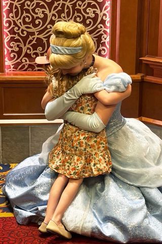 Princess Lilibet hugging Cinderella at DisneylandCredit: Meghan Markle/Instagram