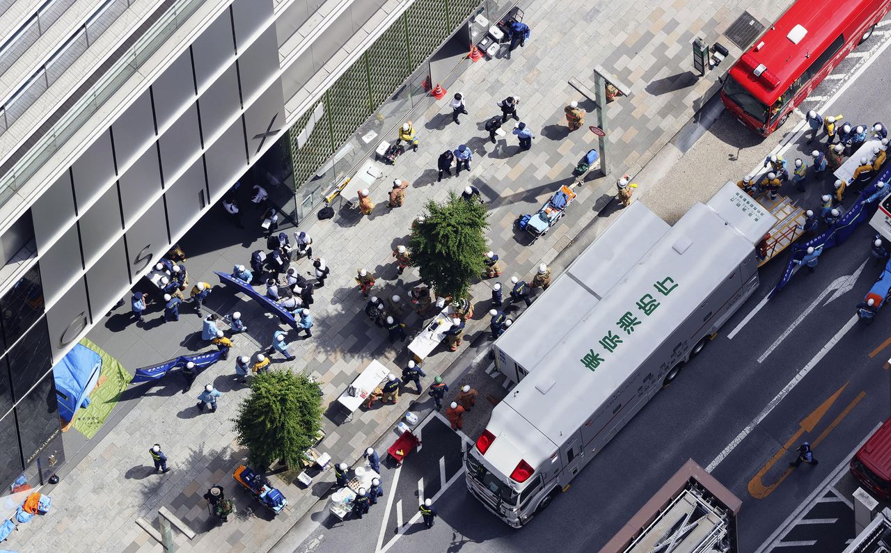 Fire trucks gather in front of the Ginza 6 shopping complex in TokyoCredit: Kyodo via AP