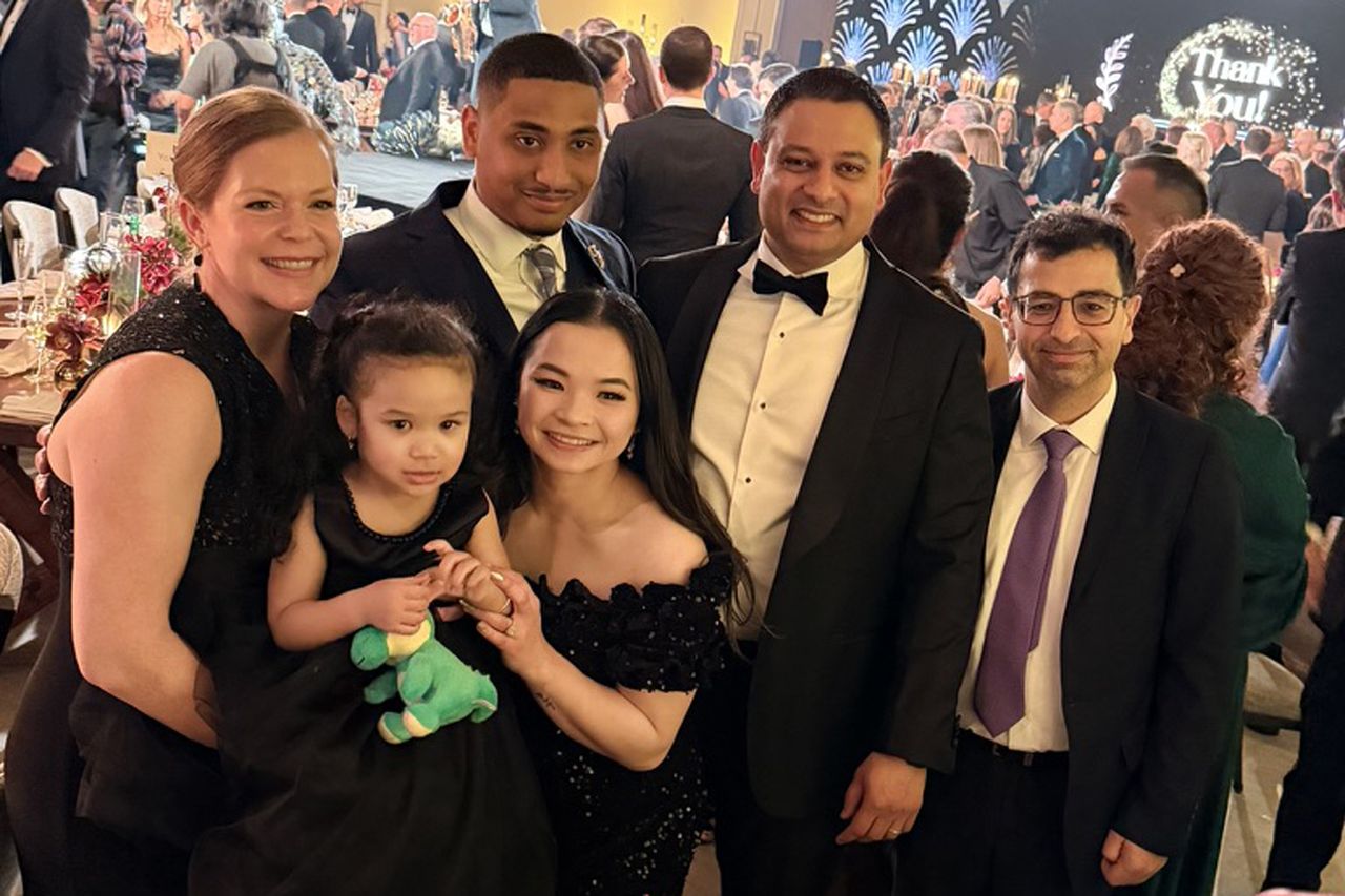 Two-year-old Milah ran around playing and jumping in-and-out of an inflatable pool at her dad's birthday party. When she woke from a nap, she couldn't stand, and when her parents had her walk, she limped. Her parents took her to the emergency room thinking maybe she had a sprained ankle. The next day, she couldn't even sit up, and soon she was paralyzed waist down. She was diagnosed with a spinal AVM. She had an 8-hour surgery, then months of rehab learning to walk again. Milah Faciane and her parents with members of her care team at the Dell Children's Star Ball in January 2026Credit: Courtesy of the Dell Children's Foundation