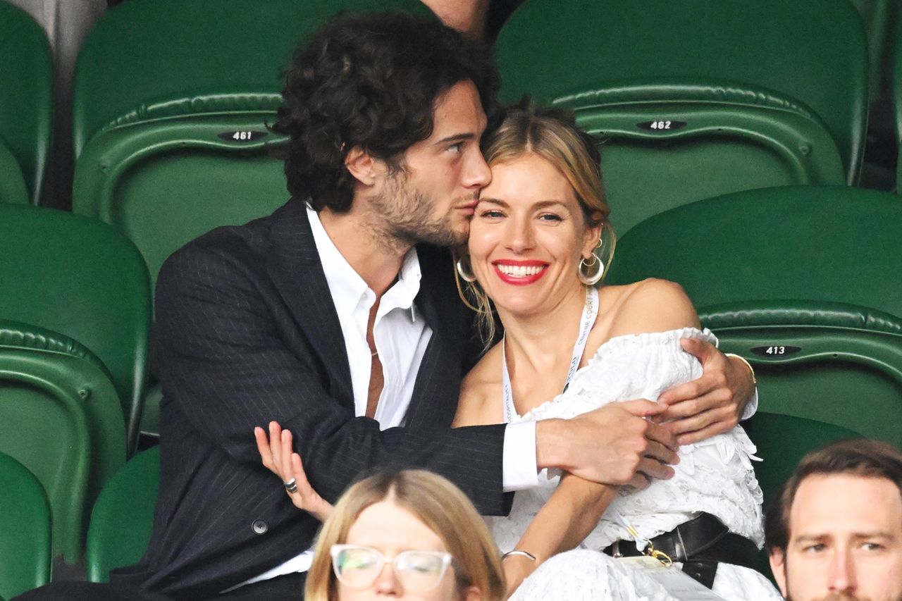 Oli Green and Sienna Miller attend the All England Lawn Tennis and Croquet Club in July 2022.Credit: Karwai Tang/WireImage