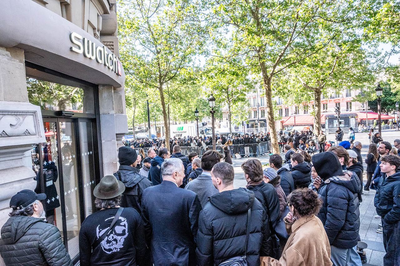 Line outside of Swatch store in ParisCredit: Laurent Caron / Hans Lucas / AFP via Getty
