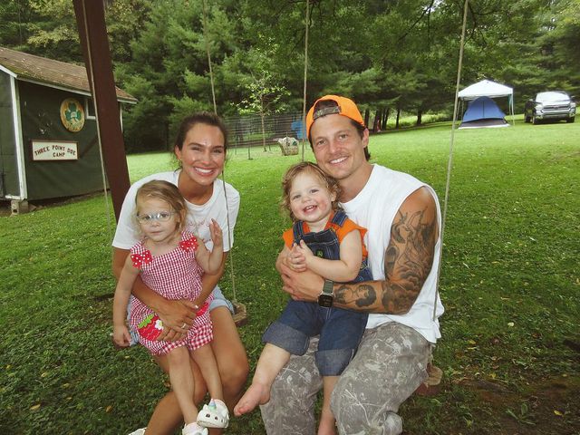 Abbie and Josh Herbert with two of their children.Credit: Abbie Herbert/Instagram