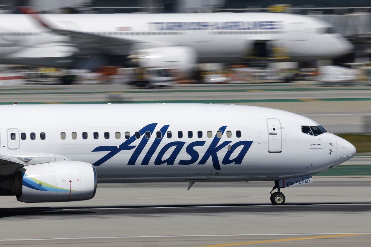 An Alaska Airlines Boeing 737 airplane departs Los Angeles International Airport on March 7, 2026.Credit: Kevin Carter/Getty