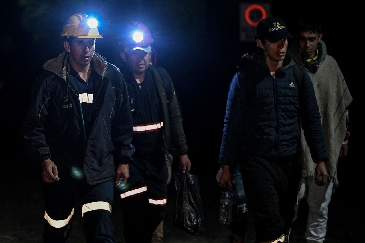 Miners walking around the site of the explosion in Colombia on May 4, 2026Credit: Luis ACOSTA / AFP via Getty