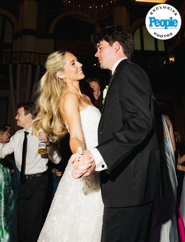 A bride and groom dancing at their wedding reception Honor and Harper Bisagno's weddingCredit: Melina Massengill