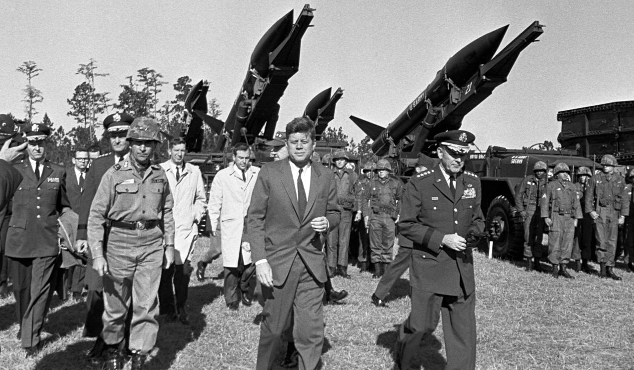 President John F Kennedy during an inspection tour of units staged at Fort Stewart, Georgia, on Nov. 26, 1962.Credit: Corbis via Getty