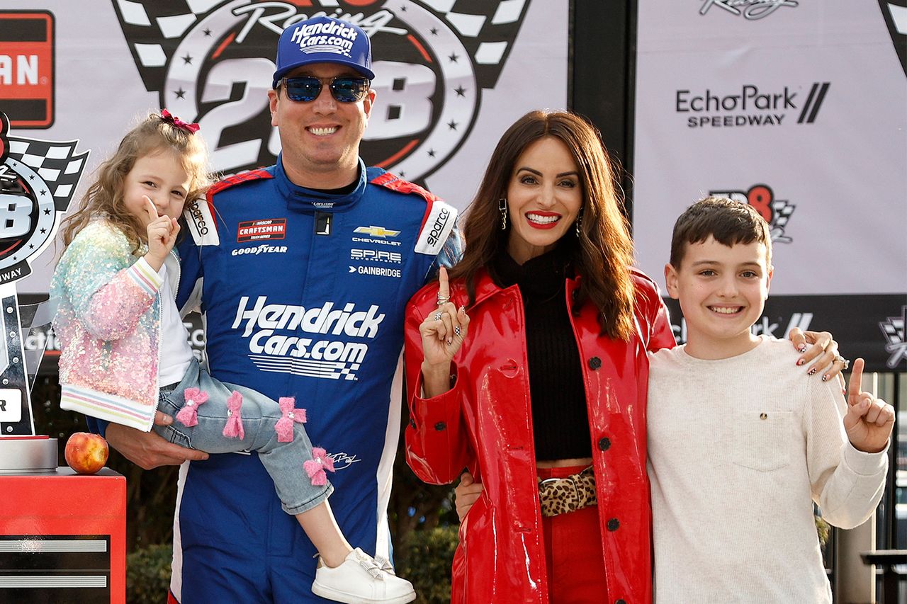Kyle Busch celebrates with daughter Lennix Busch, son Brexton Busch and his wife, Samantha Busch, after winning the NASCAR Craftsman Truck Series Fr8 Racing 208 at Echo Park Speedway on Feb. 21, 2026 in Hampton, Ga.Credit: Sean Gardner/Getty