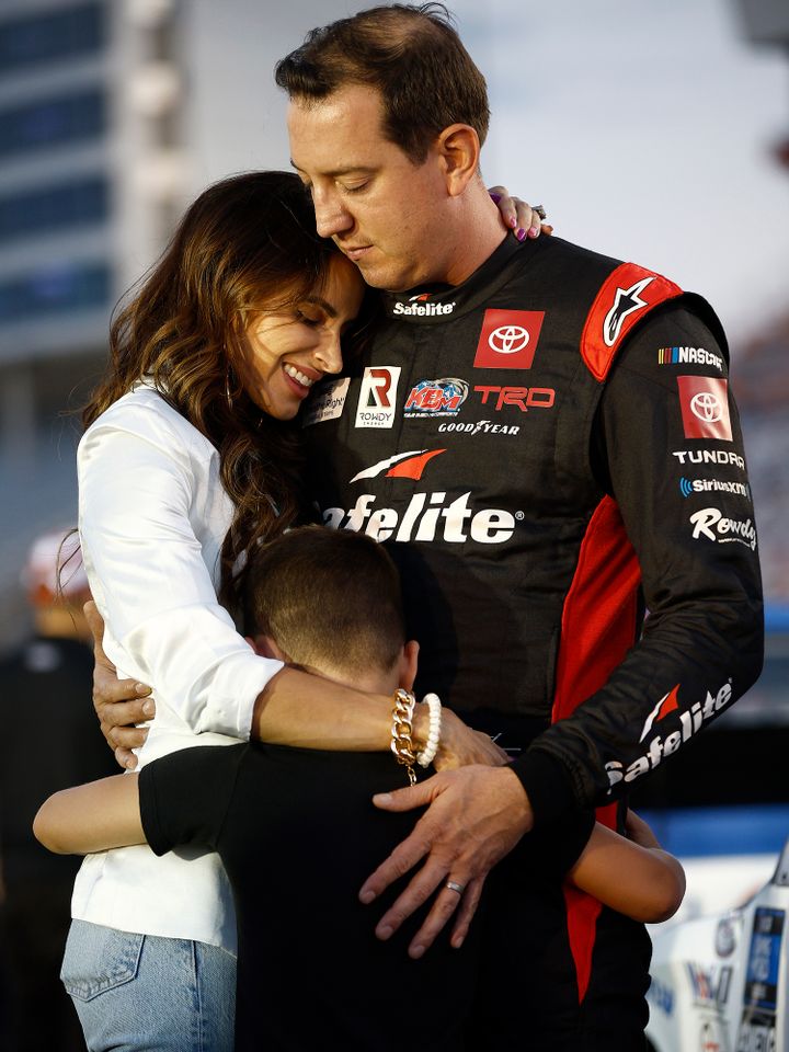 Kyle Busch, Samantha Busch, and their son Brexton Busch prior to the NASCAR Camping World Truck Series North Carolina Education Lottery 200 on May 27, 2022 in Concord, North Carolina.Credit: Jared C. Tilton/Getty