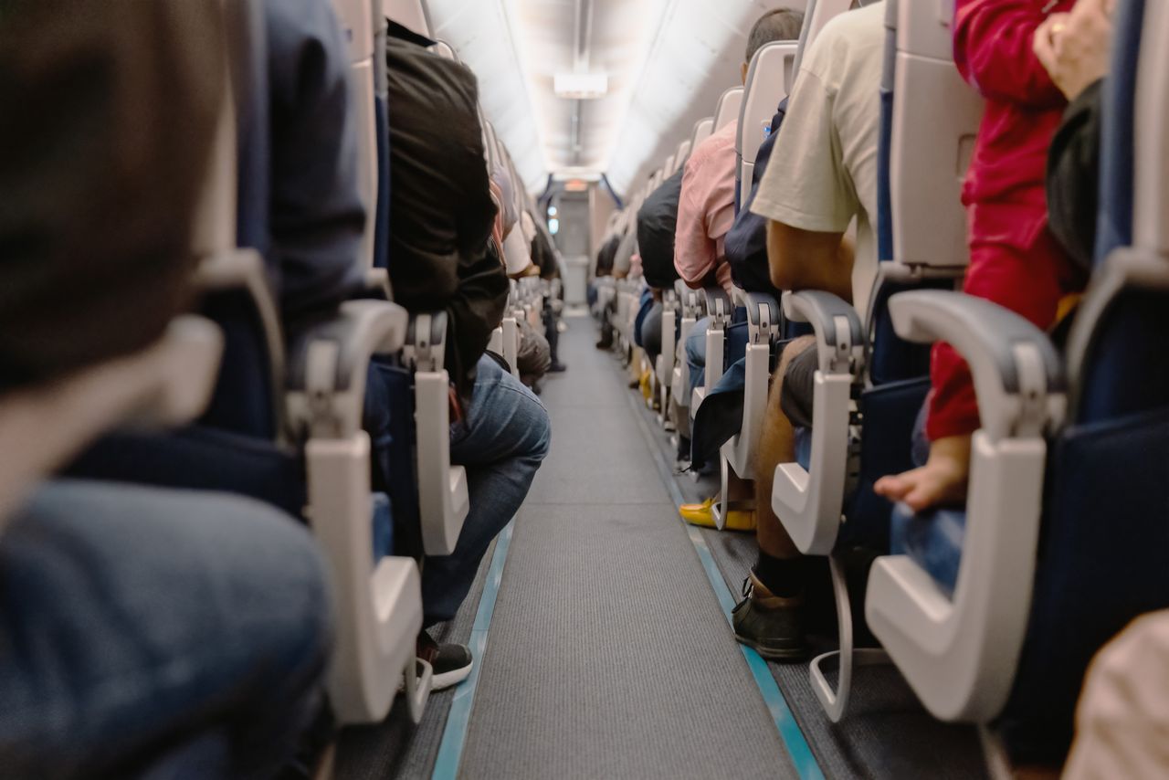 People sitting on a plane (stock image)Credit: Constantine Johnny/Getty