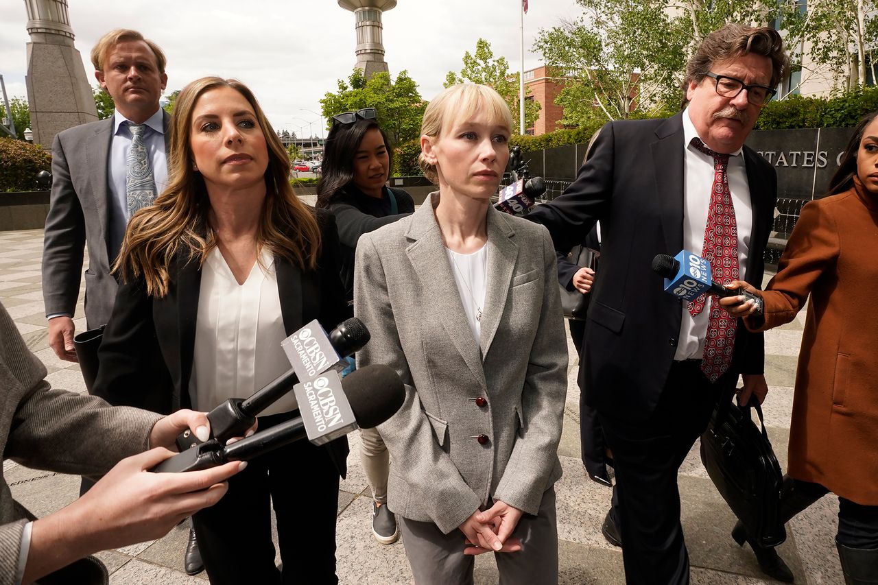 Sherri Papini walks to the federal courthouse accompanied by her attorney, Willian Portanova on April 13, 2022 in Sacramento, CA..Credit: Rich Pedroncelli/AP