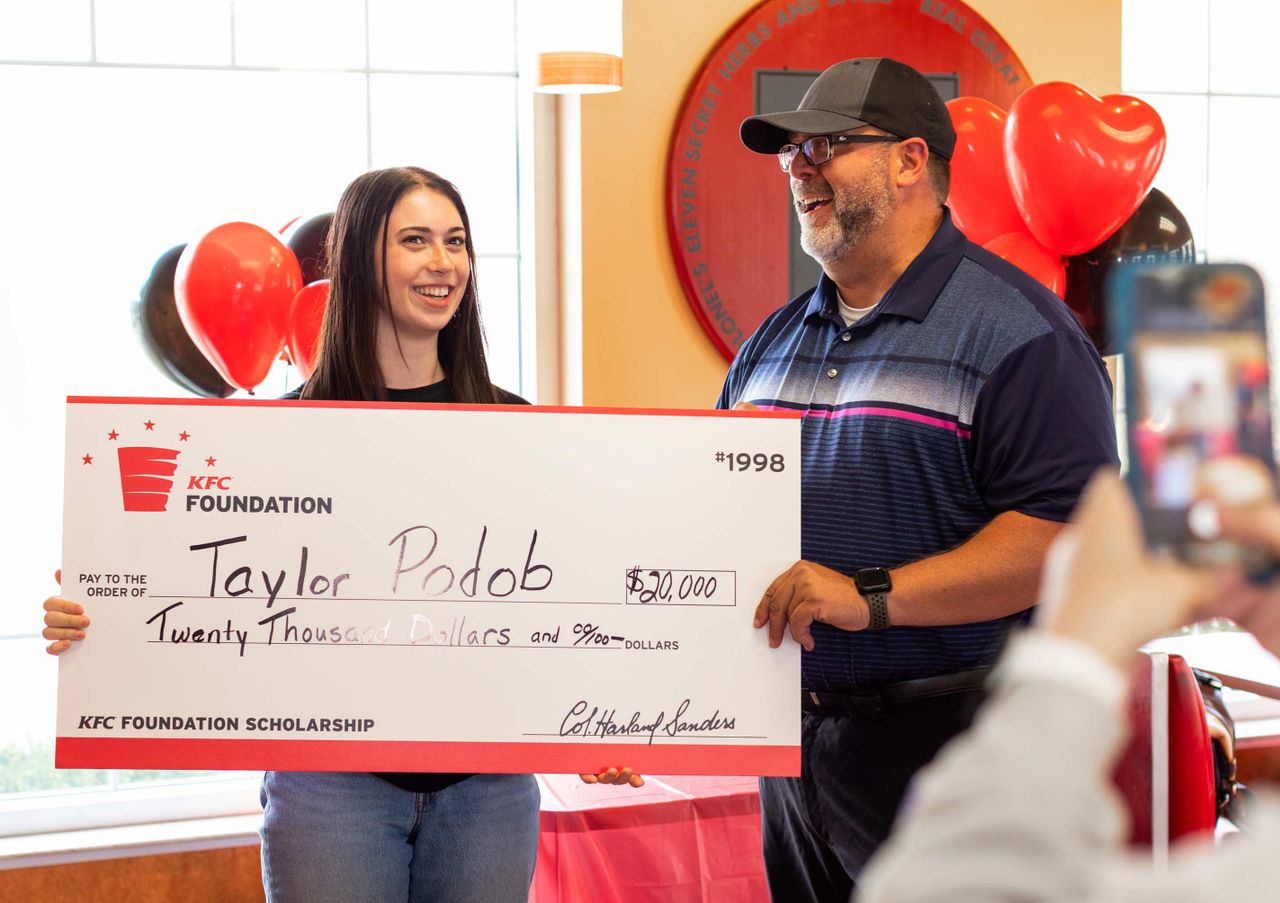 Taylor Podob accepts scholarship from the KFC FoundationCredit: Courtesy of the KFC Foundation