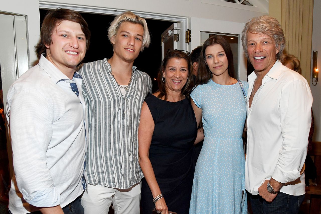 A group of five individuals posing indoors all smiling Jon Bon Jovi and wife Dorothea with sons Jesse and Jake and daughter Stephanie in 2019Credit: Kevin Mazur/Getty