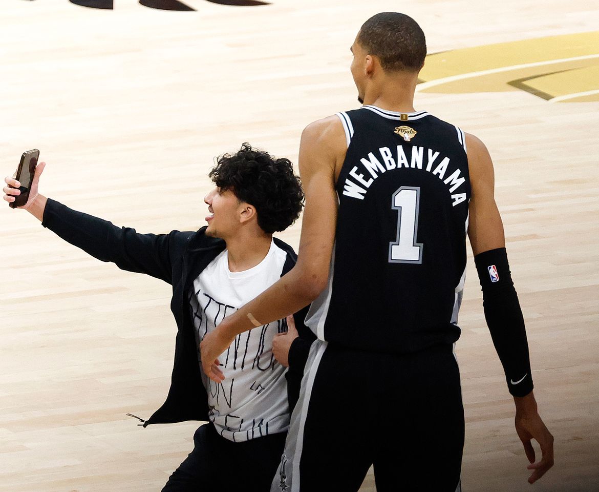 A juvenile fan with Victor Wembanyama in San Antonio on June 3, 2026Credit: Ronald Cortes/Getty