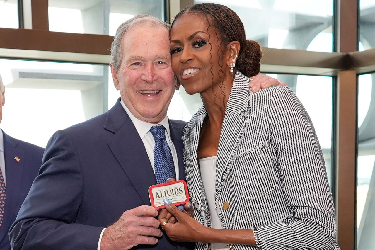 George W. Bush and Michelle Obama share a tin of Altoid mints ahead of the dedication ceremony for the opening of the Barack Obama Presidential Center on June 18, 2026Credit: Pablo Martinez Monsivais-Pool/Getty