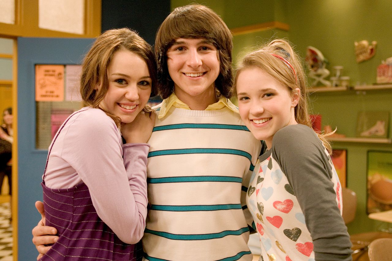 Miley Cyrus, Mitchel Musso, and Emily Osment on 'Hannah Montana.'Credit: Joel Warren/Disney General Entertainment Content via Getty