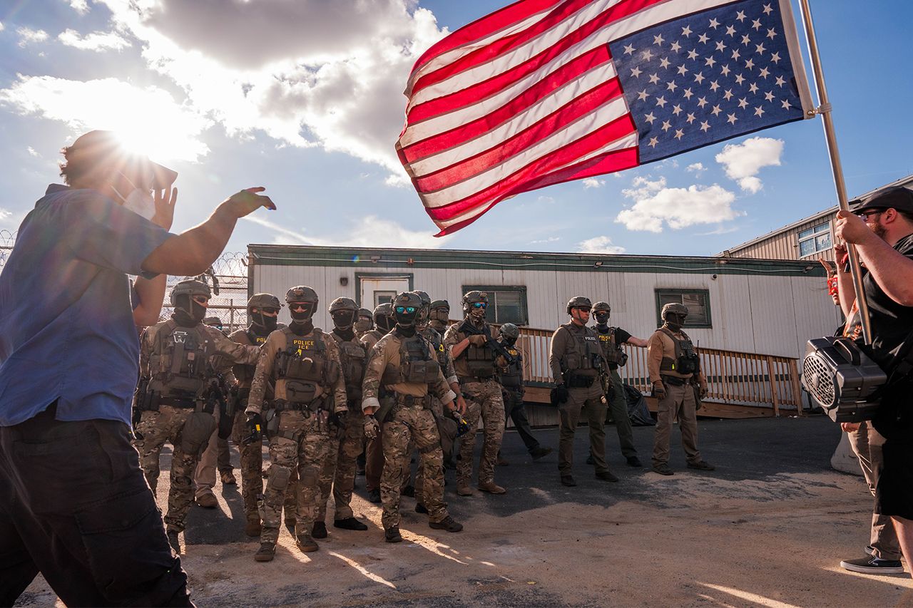 ICE agents face off with protesters outside of Delaney Hall Immigration Detention Center on June 7 in Newark, N.J.Credit: Adam Gray/Getty