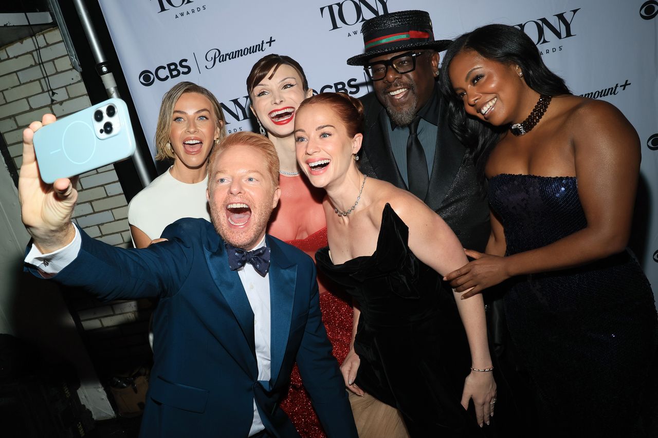 Julianne Hough, Jesse Tyler Ferguson, Dylan Mulvaney, Whitney Leavitt, Cedric the Entertainer and Adrienne Warren attend The 79th Annual Tony Awards at Radio City Music Hall on June 07, 2026 Credit: Jemal Countess/Getty