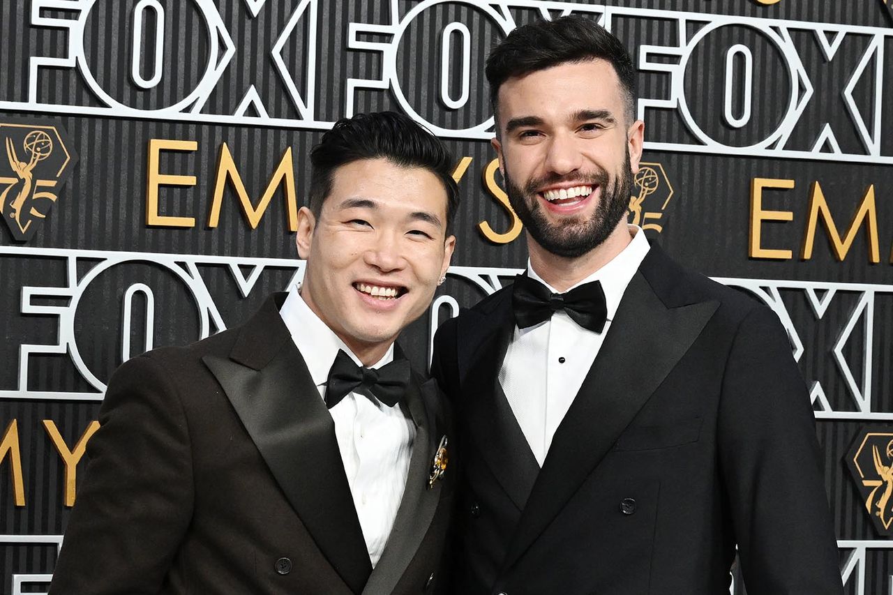 Joel Kim Booster and John-Michael Sudsina at the 75th Primetime Emmy Awards in L.A. on Jan. 15, 2024Credit: Gilbert Flores/Variety via Getty