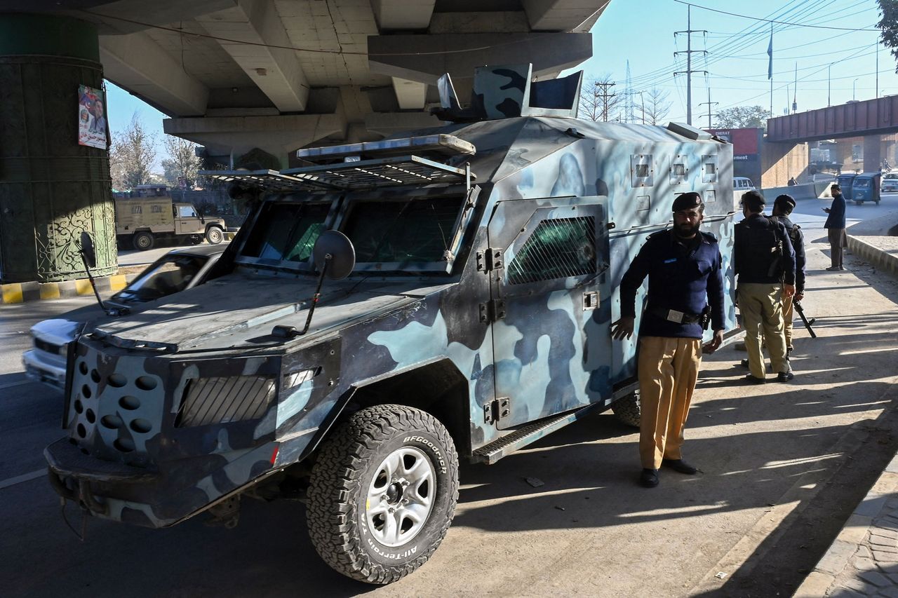 Police in Peshawar, Pakistan, on Feb. 9, 2024.Credit: ABDUL MAJEED/AFP via Getty