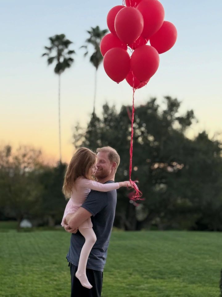 Prince Harry holds Princess LilibetCredit: Meghan Markle/Instagram
