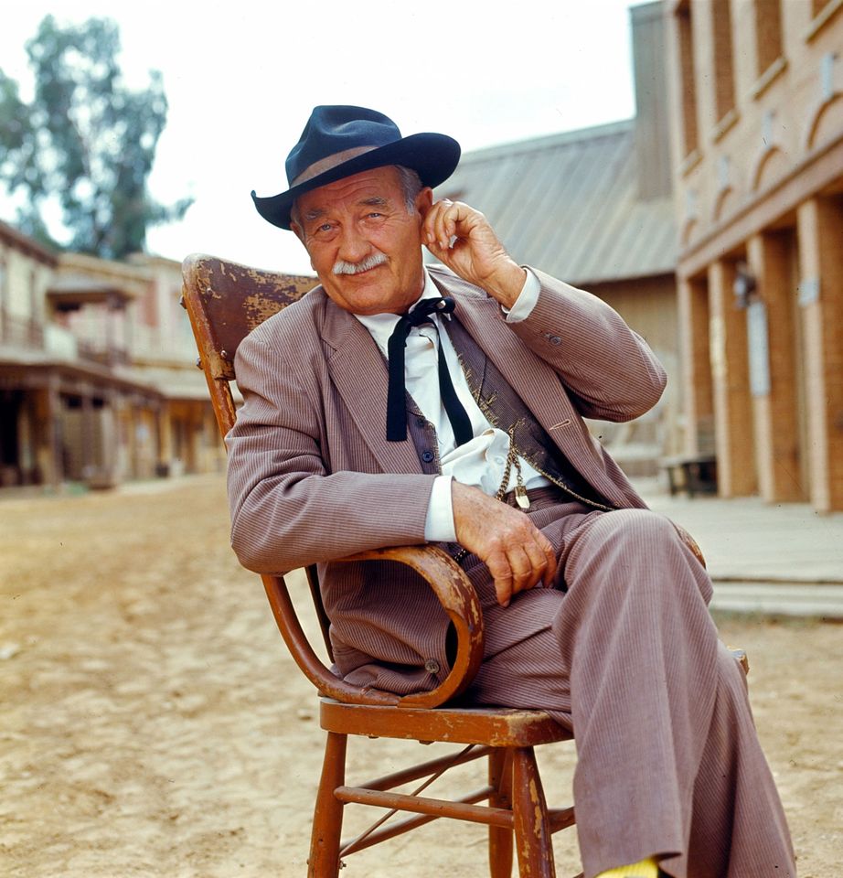 Milburn Stone as Dr. Galen 