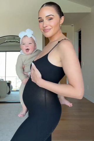 Olivia Culpo sharing her baby bump alongside her daughter, ColetteCredit: Olivia Culpo/TikTok
