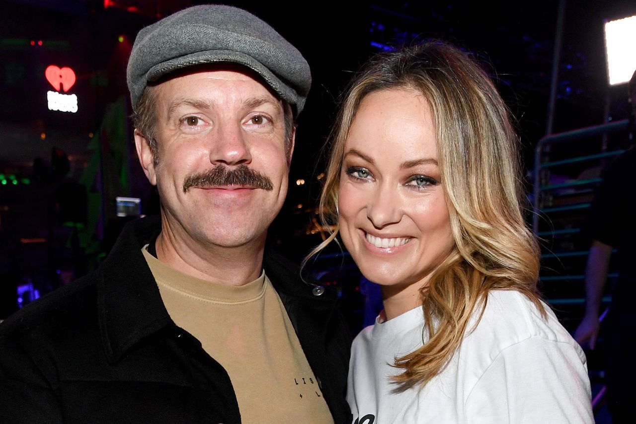 Jason Sudeikis (L) and Olivia Wilde pose backstage at iHeartRadio's Z100 Jingle Ball 2019Credit: Kevin Mazur/Getty