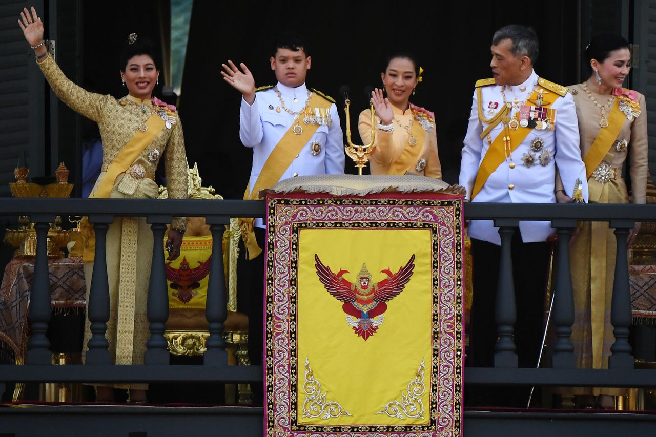 Thailand's King Maha Vajiralongkorn (2nd R) and Queen Suthida (R) wave to well-wishers with his children Princess Sirivannavari Nariratana (L), Prince Dipangkorn Rasmijoti (2nd L) and Princess Bajrakitiyabha Mahidol in 2019Credit: JEWEL SAMAD/AFP via Getty
