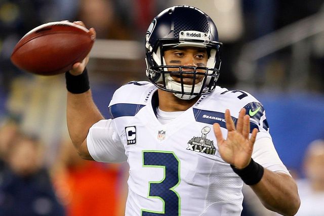EAST RUTHERFORD, NJ - FEBRUARY 02: Quarterback Russell Wilson #3 of the Seattle Seahawks looks to pass against the Denver Broncos during Super Bowl XLVIII at MetLife Stadium on February 2, 2014 in East Rutherford, New Jersey. Russell WilsonCredit: undefined